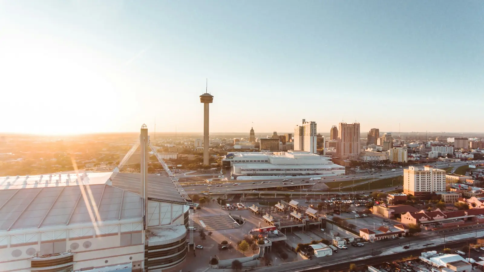 Downtown San Antonio and the Tower of the Americas at sunrise, seen from above